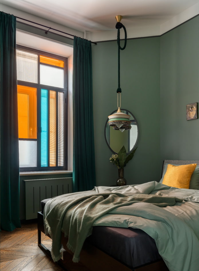 lighting in the interior of the bedroom in green tones