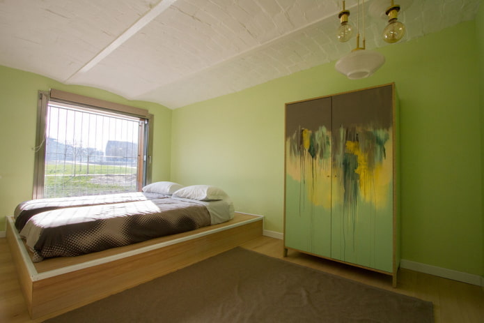 furnishings in the interior of the bedroom in green tones