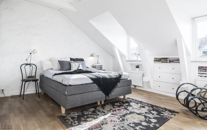 Scandinavian style attic bedroom interior