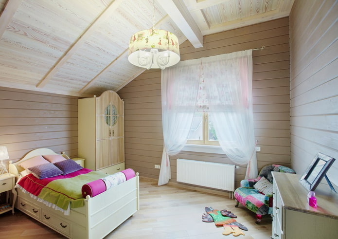 design of a nursery in the interior of a log house