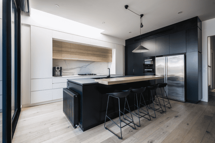 White kitchen with black set