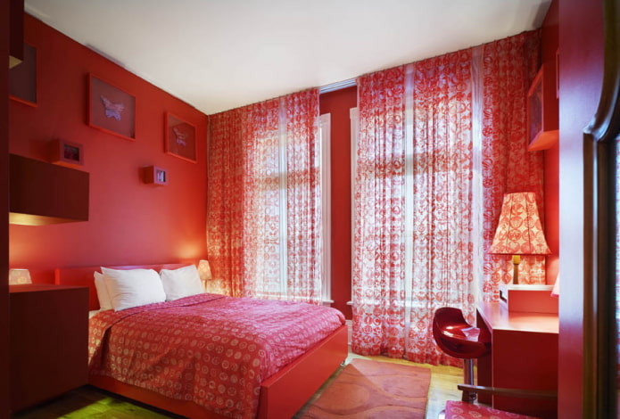 bedroom interior in pink and red colors
