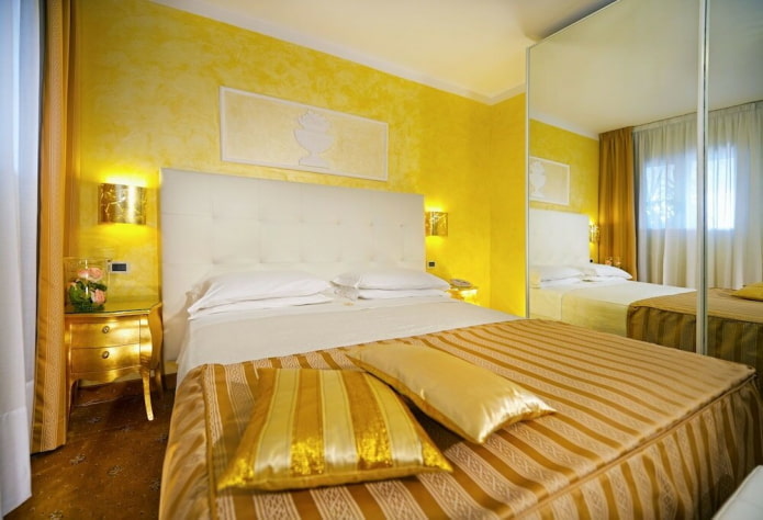 textile decoration of the bedroom in yellow tones