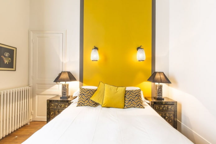 decor and lighting in the interior of the bedroom in yellow tones
