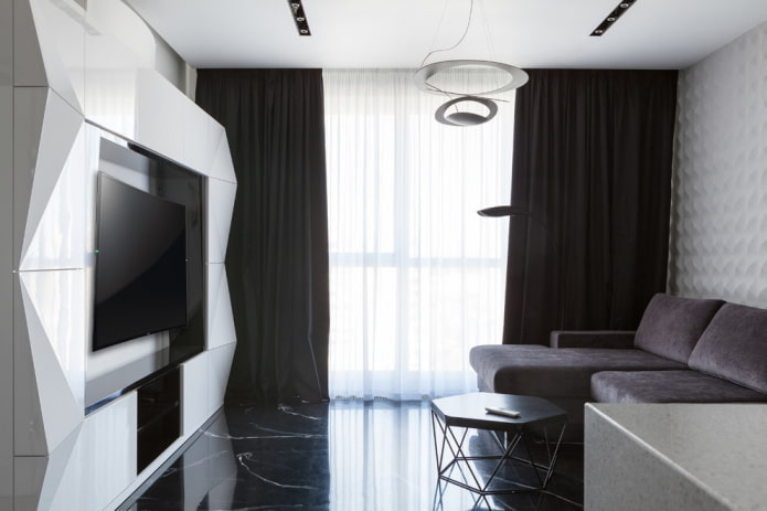 Einrichtung und Textilien im Wohnzimmer in Schwarz-Weiß