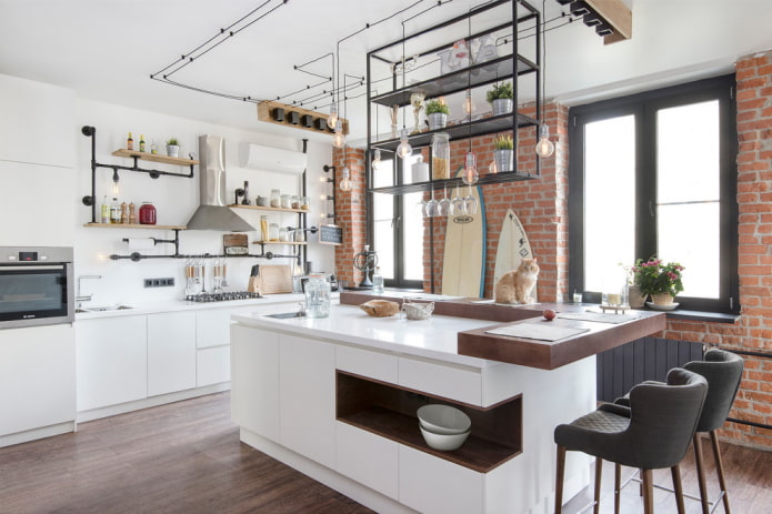 island in the interior of a loft-style kitchen