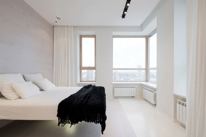 Textilien im Innenraum des Schlafzimmers im minimalistischen Stil