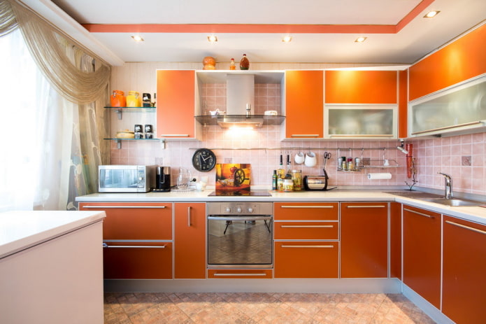 decor in the interior of the kitchen in orange tones