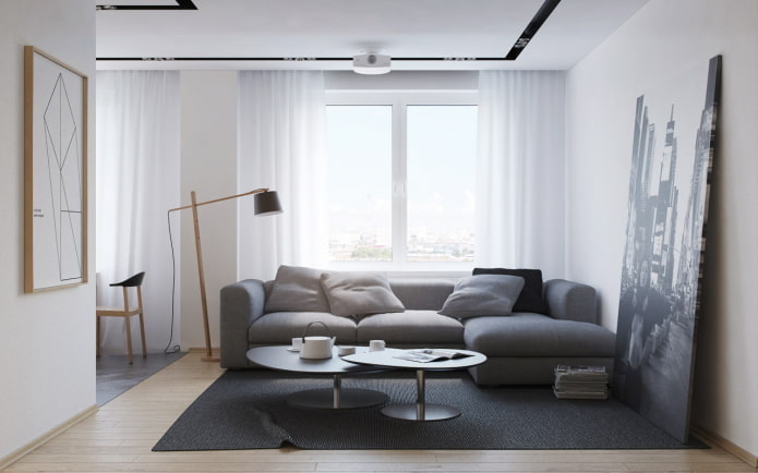 Einrichtung und Beleuchtung im Wohnzimmer im minimalistischen Stil