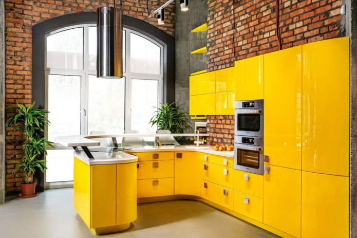 kitchen in yellow tones in the loft style