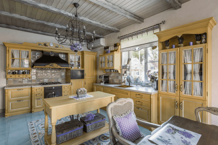 kitchen in yellow tones in Provence style