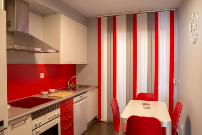 curtains in the interior of the kitchen in red tones
