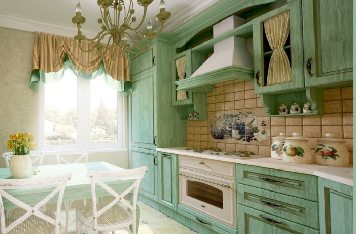 Provence style in the interior of a green kitchen