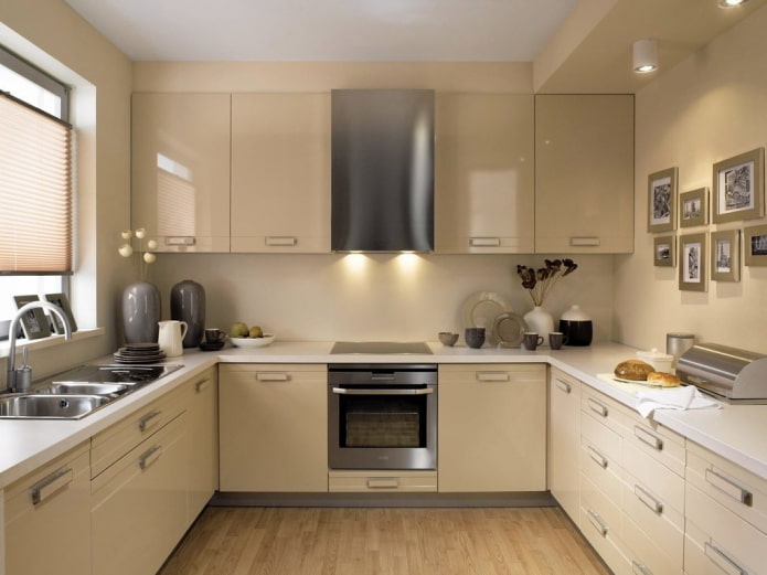 furniture and appliances in the interior of the kitchen in beige tones