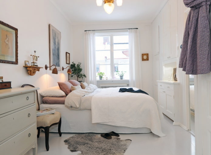 fehér skandináv stílusú hálószoba belső