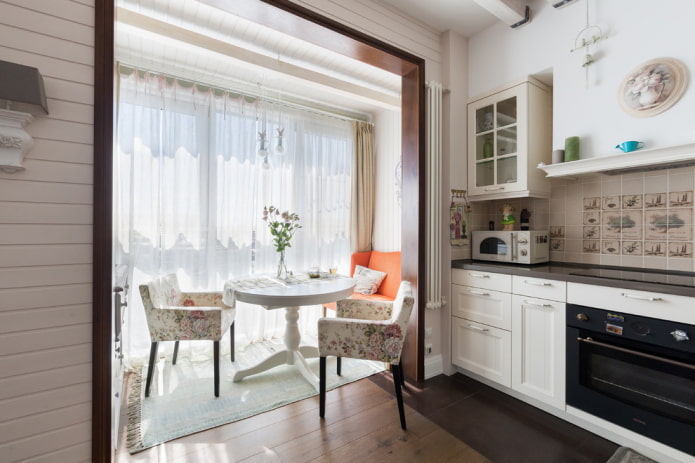furnishings in the interior of the kitchen combined with the loggia