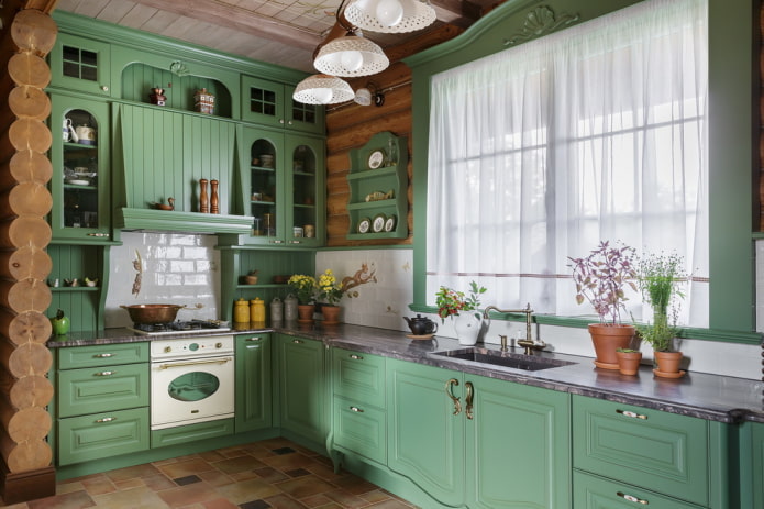 curtains in the interior of the kitchen in green tones