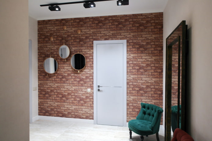 hallway with a brick wall in an industrial style