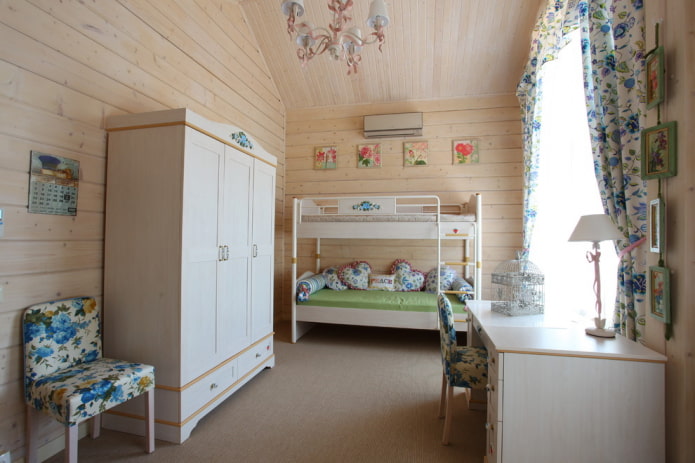 furniture in the interior of a children's bedroom in the style of Provence