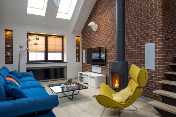fireplace in the interior of the living room in the loft style