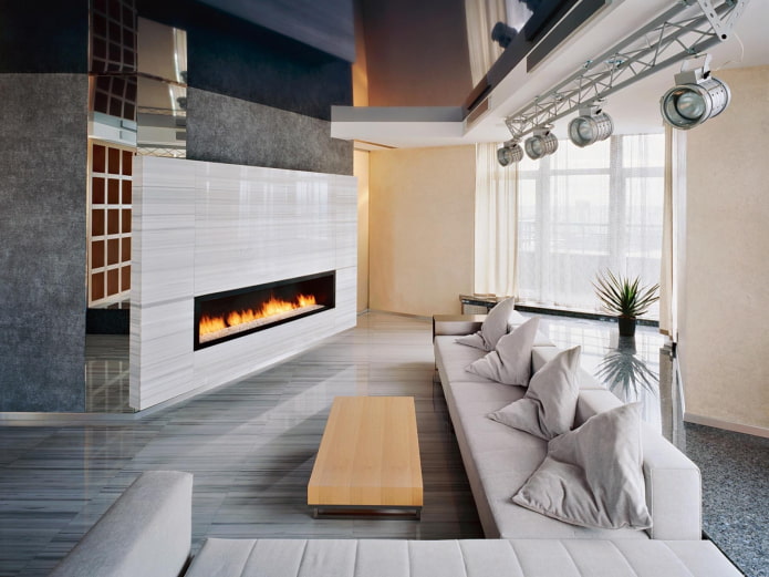 fireplace in the interior of the living room in high-tech style