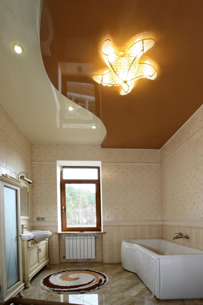 stretch ceiling with a chandelier in the bathroom