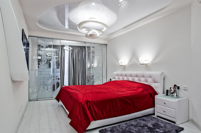 chandelier on the ceiling in the bedroom in a modern style