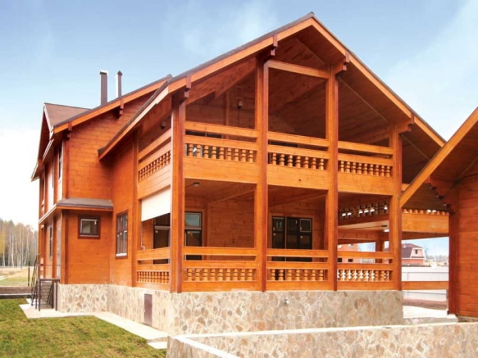 project of a wooden house with a balcony