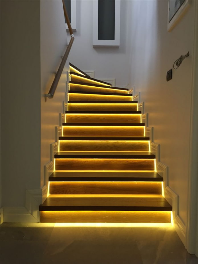 staircase with steps illuminated in the house