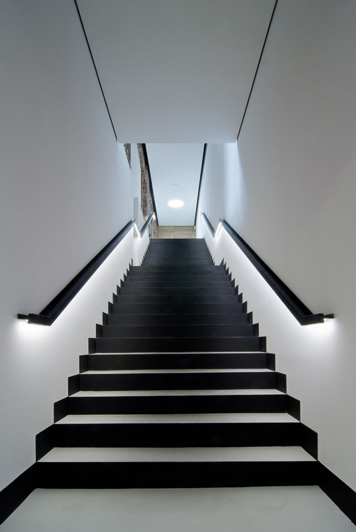 staircase with illuminated railing in the house