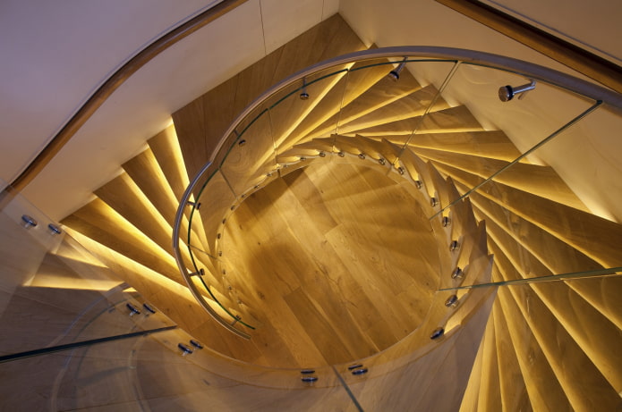 illumination of a spiral staircase in the house