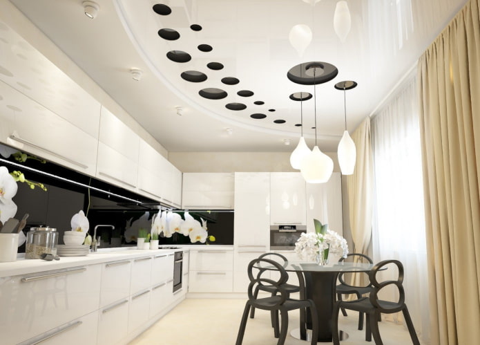 stretch ceiling with a chandelier in the interior of the kitchen