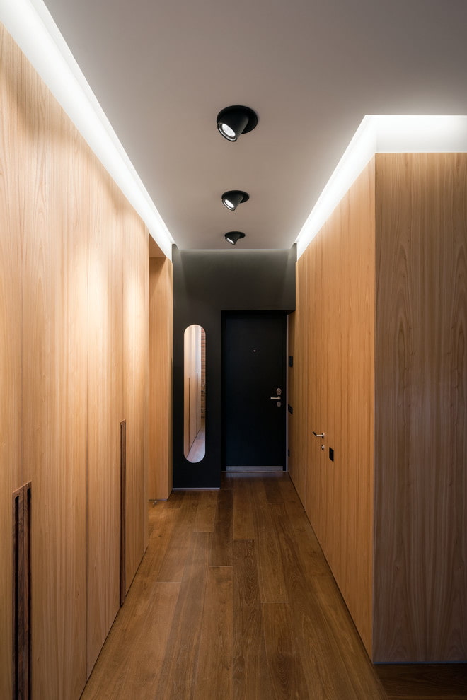 lighting in the interior of a long corridor