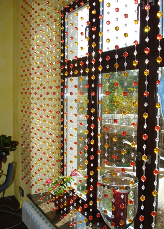 design of filament curtains in the interior of the kitchen