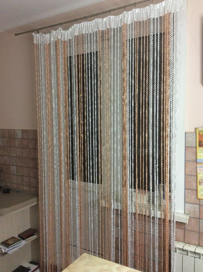 design of filament curtains in the interior of the kitchen