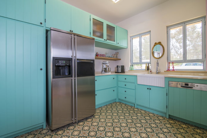 the floor in the interior of the kitchen is turquoise