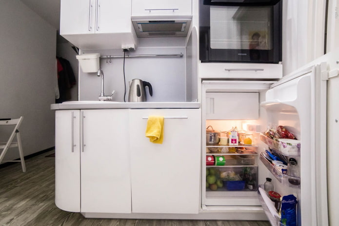 small refrigerator under the countertop