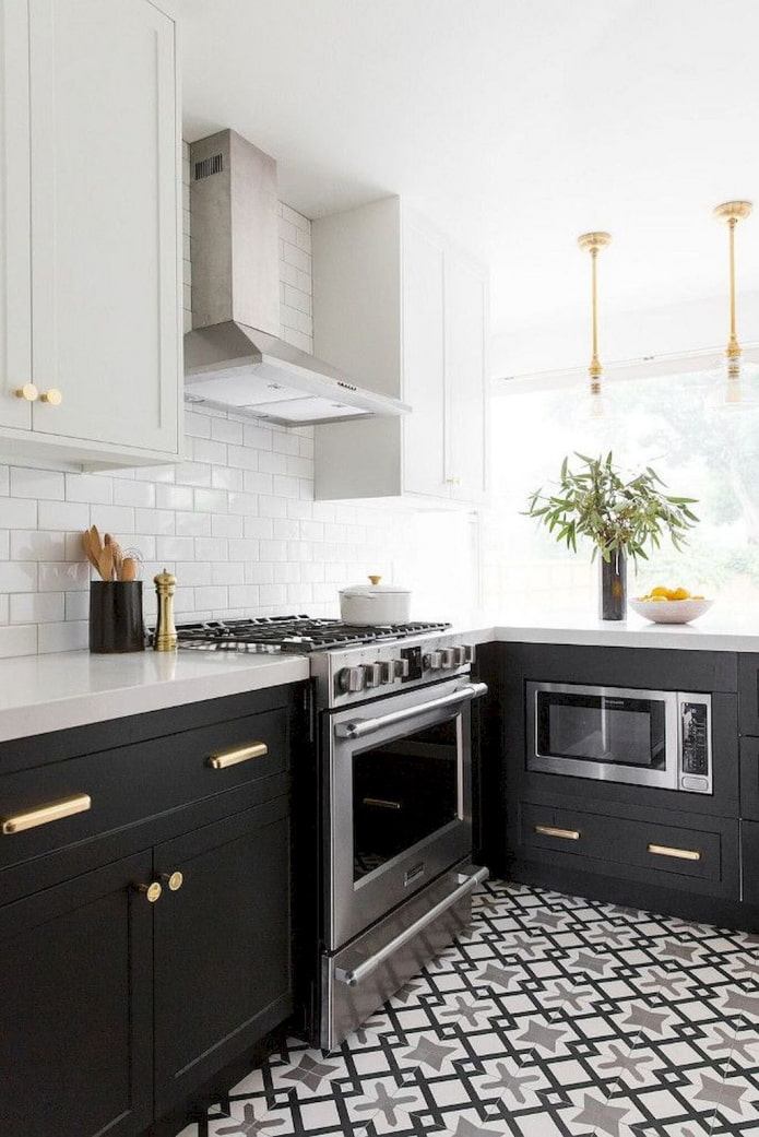 black kitchen with gold