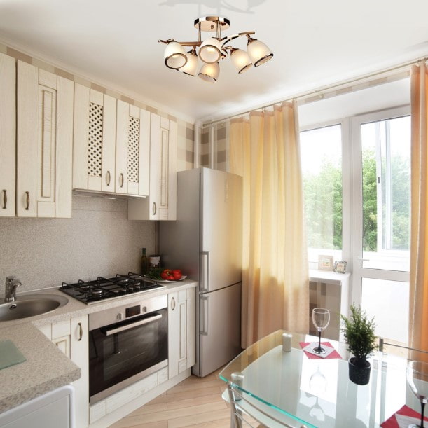 small kitchen with floor-length curtains