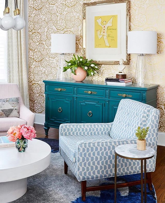 Living room with turquoise chest of drawers