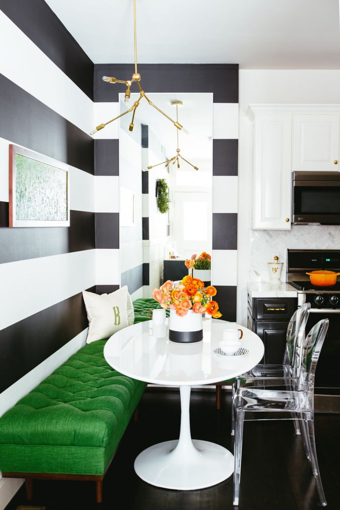 black and white kitchen with green
