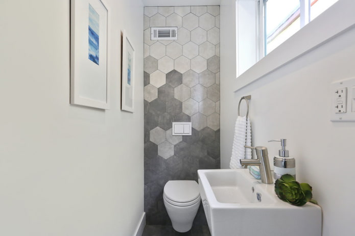 Honeycomb tiles behind the toilet