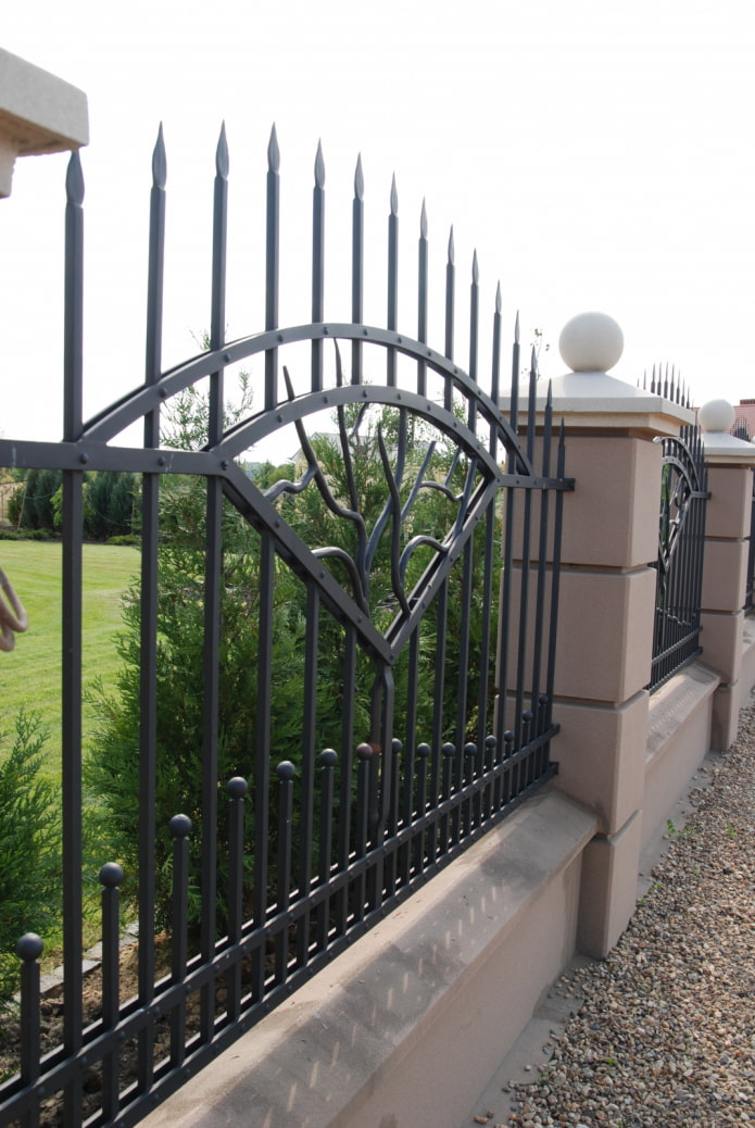 forged fence with concrete columns