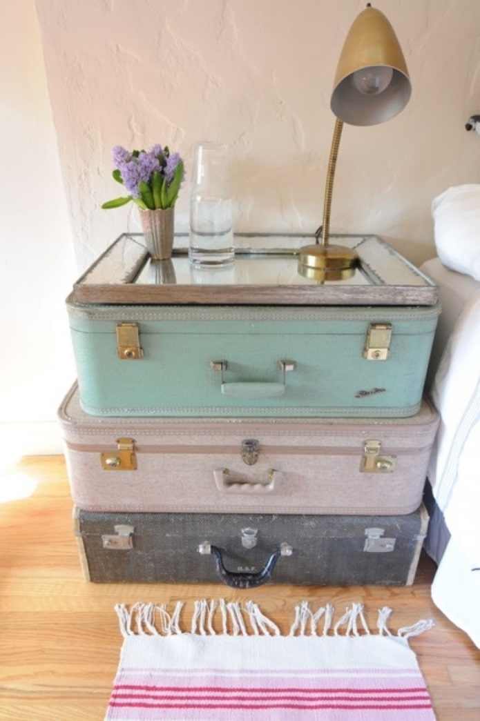 bedside table of suitcases
