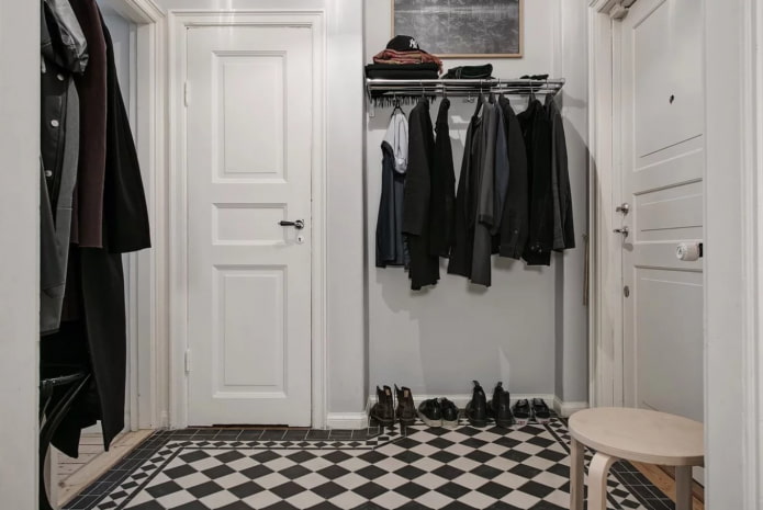 black and white tiles on the floor