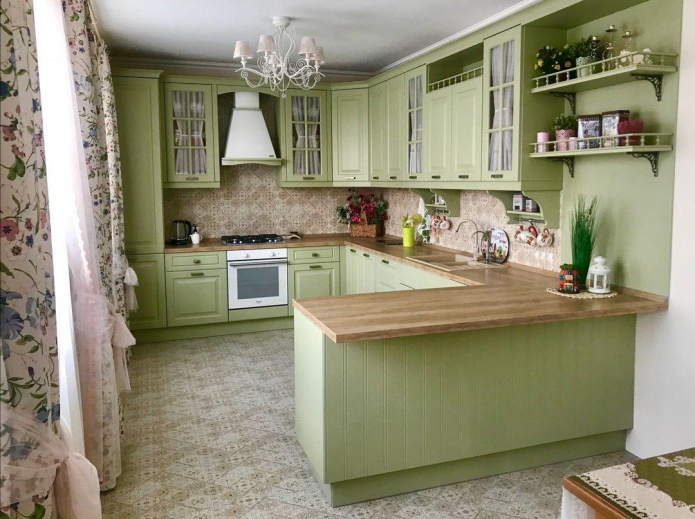 olive kitchen with wood countertop
