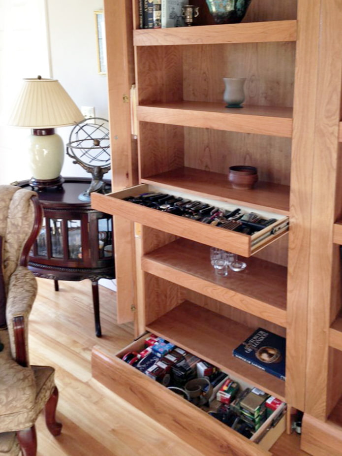 Cabinet with hidden shelves