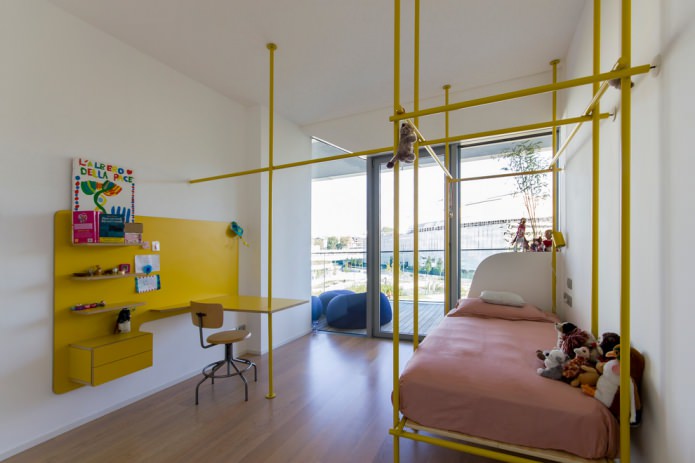 yellow pipes in the design of the nursery