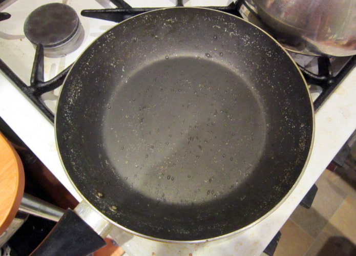 Frying pan with damaged bottom