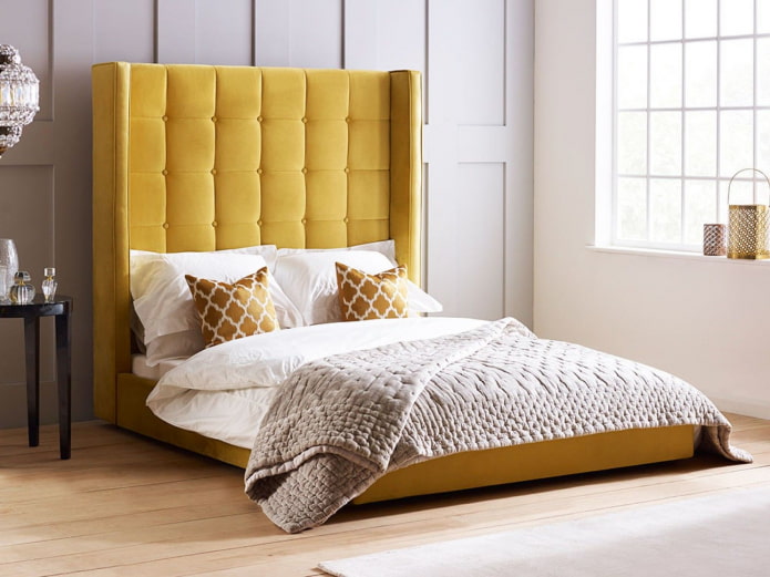 bed with a high headboard
